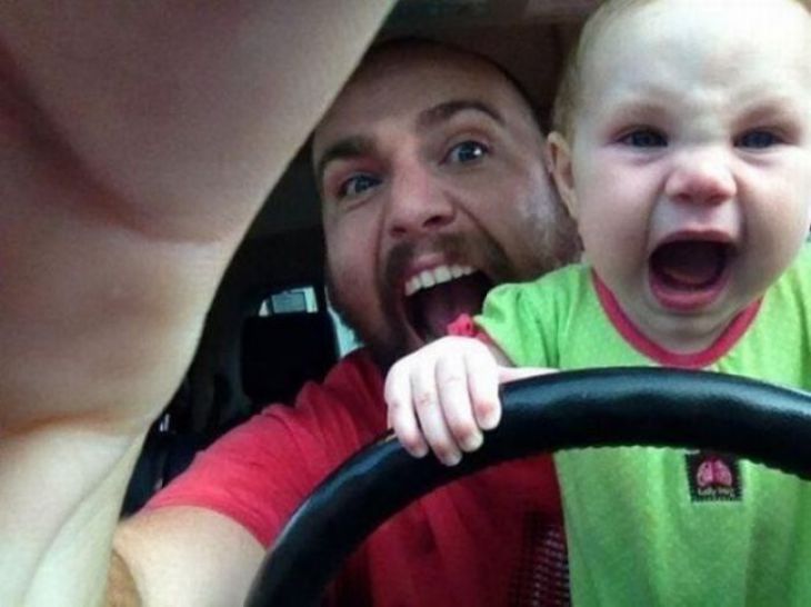 Dad and son driving