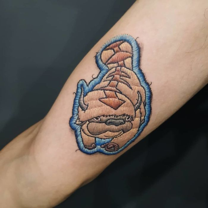 Tatuaż dłoni - pies