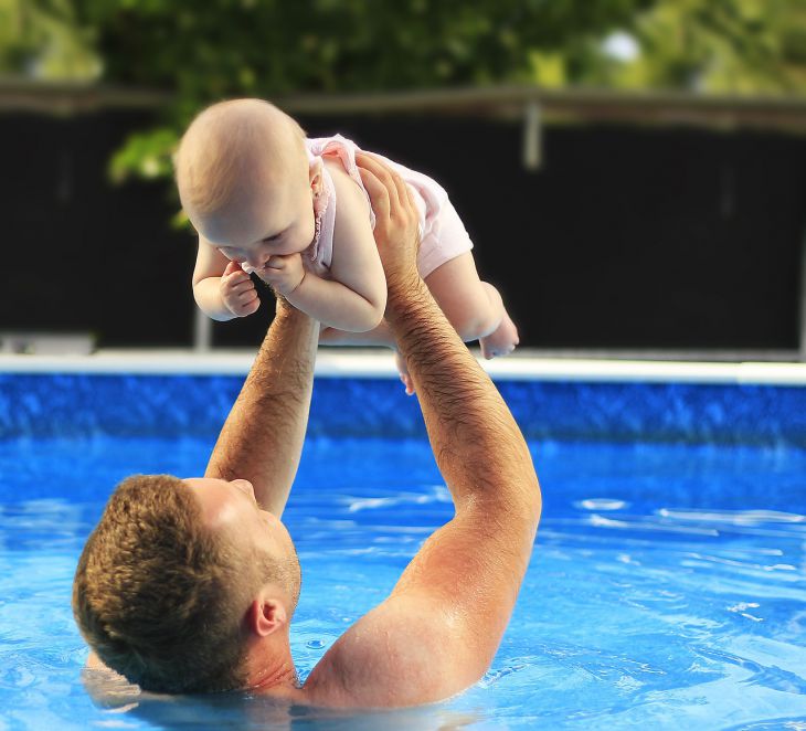 Dad and baby in the pool