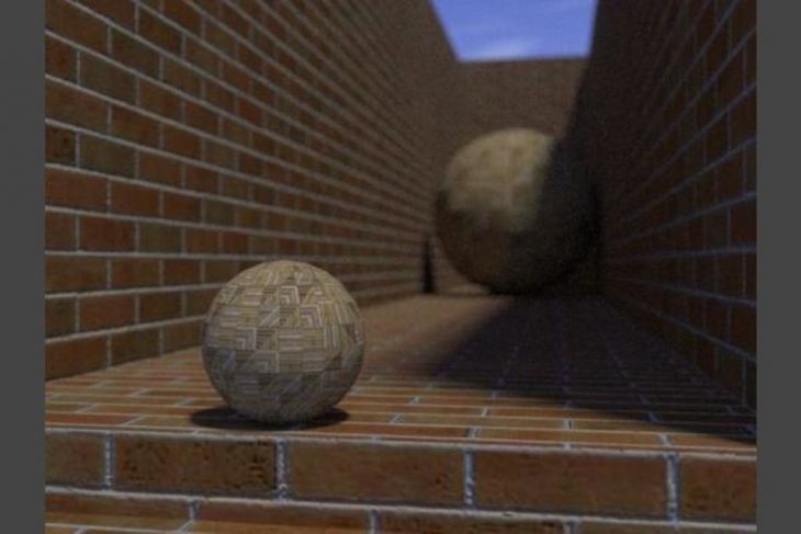2 esferas perto de tijolos